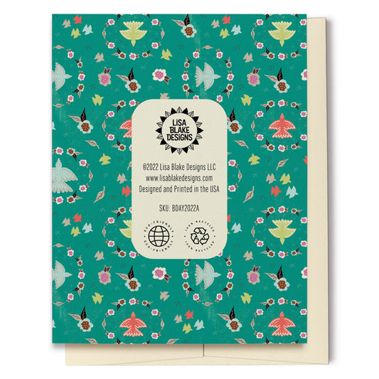 Birds & Floral Wreaths Happy Birthday Card is perfect for that special lady's birthday. Created with a vibrant teal background, this card features a layered look with texture, multi-colored flowers and birds, details reminiscent of Grandma's lace and scripted text which reads, "Happy Birthday." The pattern continues onto the back of the card.