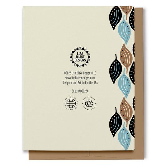 Happy Father's Day card (showing the back) with a pattern of blue, black and brown leaves on a cream background. Digitally hand drawn.