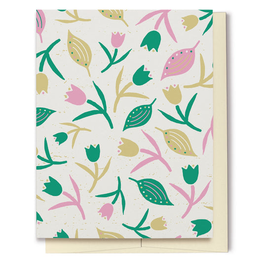 Tulips & Leaves Cream, Green & Pink Blank Card features a pattern with tulips and leaves in shades of green and pink on a cream background. The pattern extends over the back of the card too. 