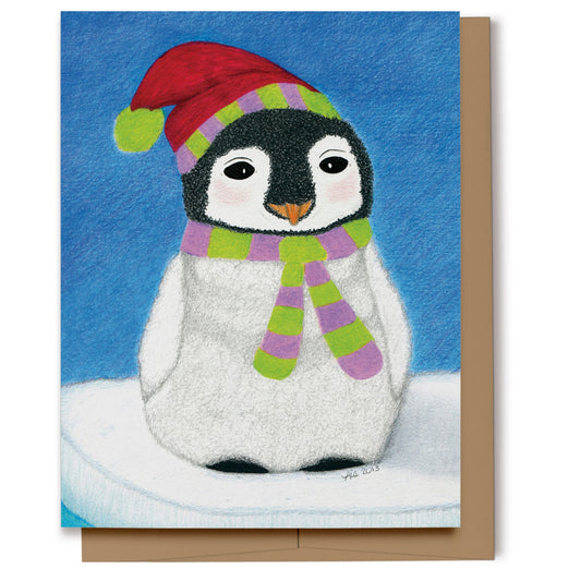 Christmas card featuring a baby penguin wearing a Santa hat with a scarf standing on an iceberg. Hand drawing using markers and colored pencils.