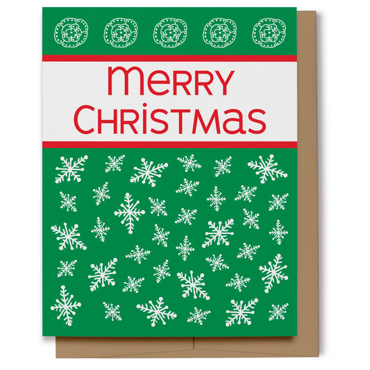 Merry Christmas card with white snowflakes on a green background with red text. 