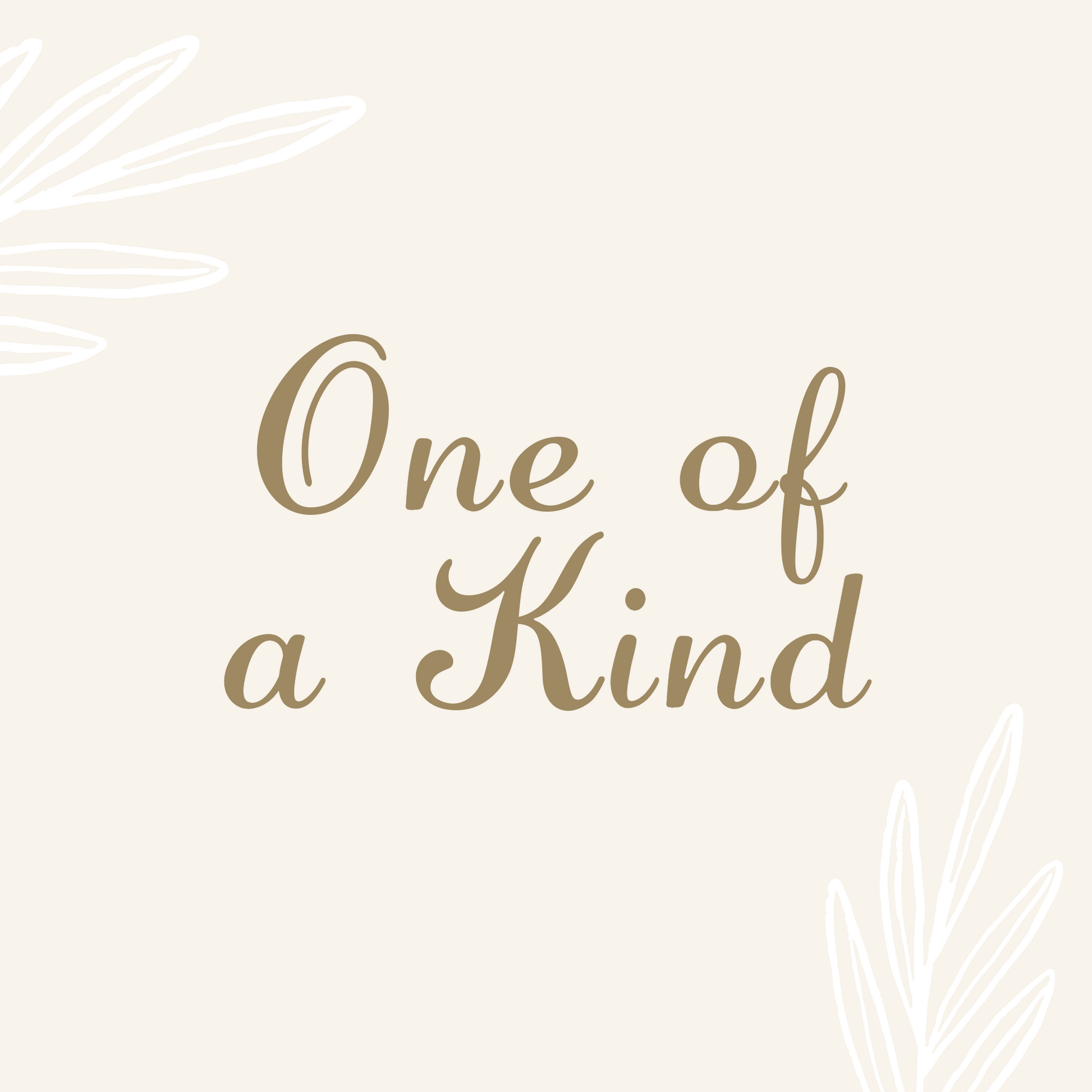 Graphic with script text which reads, "One of a Kind" on a cream background with white decorative leaves at two corners.