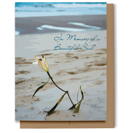 Beach themed sympathy card with a fading flower in the sand with script text which reads, "In Memory of a Beautiful Soul".